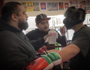 Coach Ian Cruz, Luis Rodriguez, and Anthony Barrera (Dreamland Boxing)