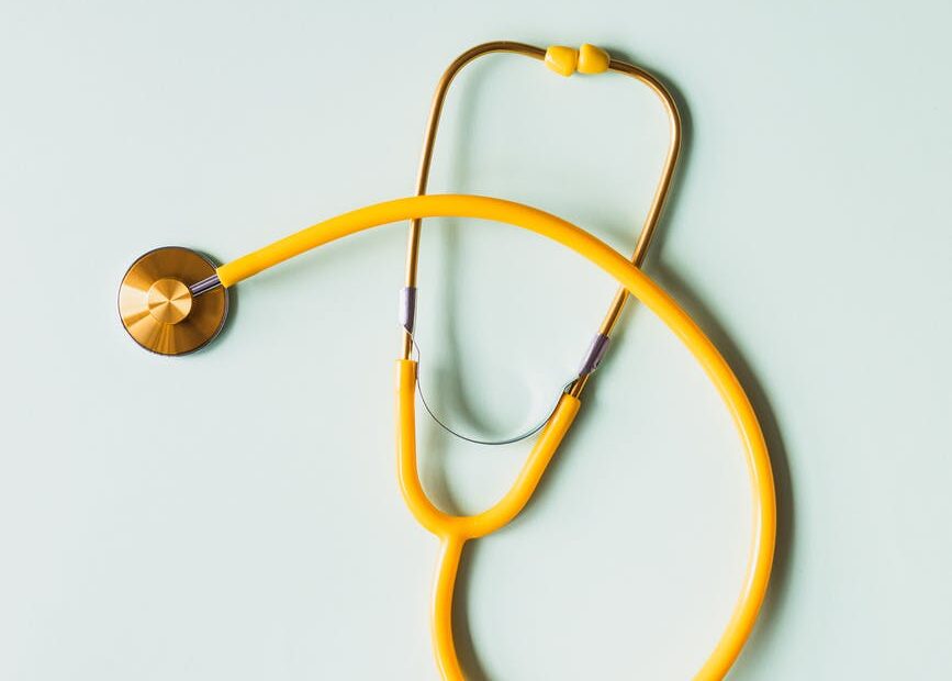 medical stethoscope placed on white background