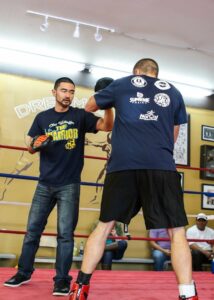 Coach Ian Cruz and Chris "The Warrior" Washington at Dreamland Boxing