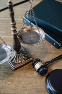 symbols of justice and law on table of judge